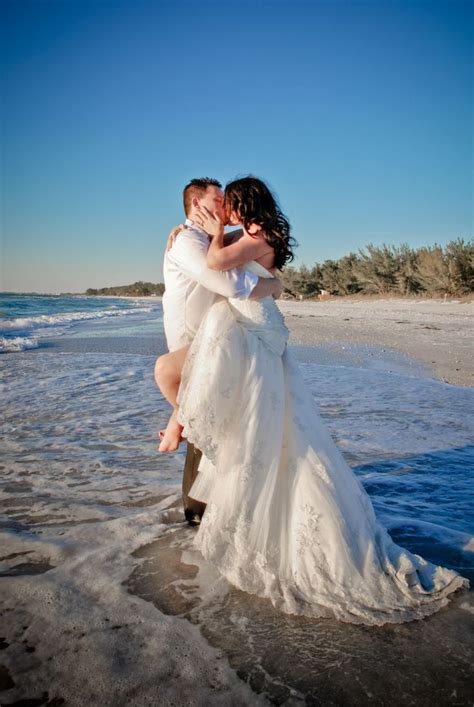 Put on an oversized sweater and make cute pics! beach trash the dress photoshoot | Beach wedding photos
