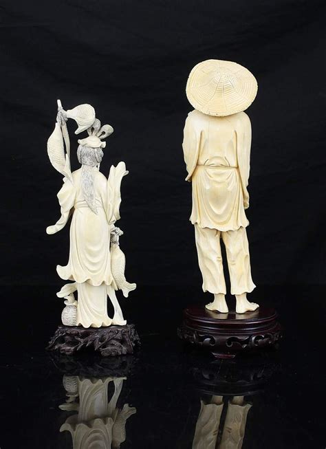Lot A Chinese Carved Ivory Figure Of A Fisherman Holding His Catch