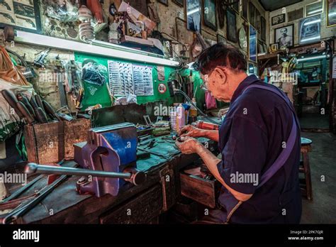 Bangkok, Thailand. 05th Apr, 2023. A gunsmith is repairing a firearm