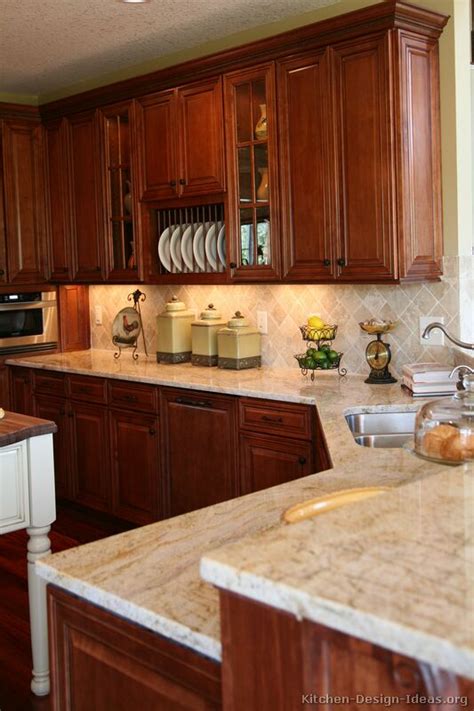 Cherry wood kitchen cabinets are beautiful and ideally suited for those looking for a warm and elegant kitchen space. Pictures of Kitchens - Traditional - Medium Wood Kitchens ...