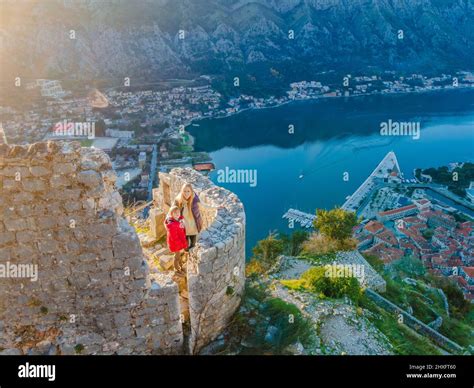 Mom And Son Travelers In Montenegro In Kotor Old Town Ladder Of Kotor