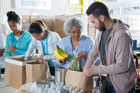 We have different volunteer opportunities available in each state, if you would like to volunteer select your state below Diverse Group Of Volunteers In Food Bank Stock Photo ...
