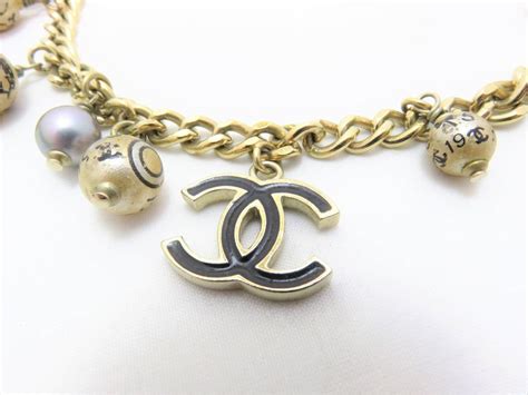 CHANEL Necklace Chain Gold CC Logo Mark Black Fake Pearl ... Well you're in luck, because here they come.