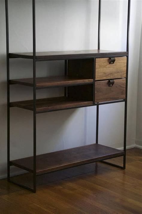This industrial shelving unit is designed by jm & sons, a priced at $1,675, this rustic furniture piece boasts a vintage appeal and looks best when featured in an open loft space that marries modern and. Modern Industrial Handmade Steel and Wood Bookshelf ...
