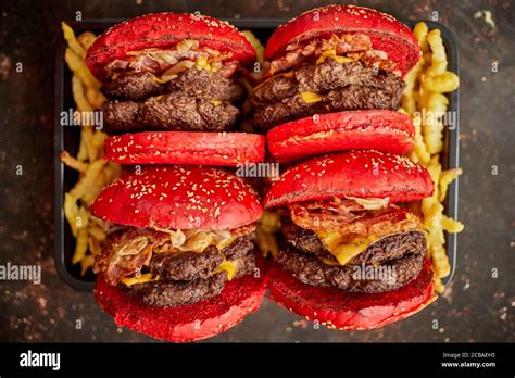 Burgers Placed On French Fries Stock Photo Alamy