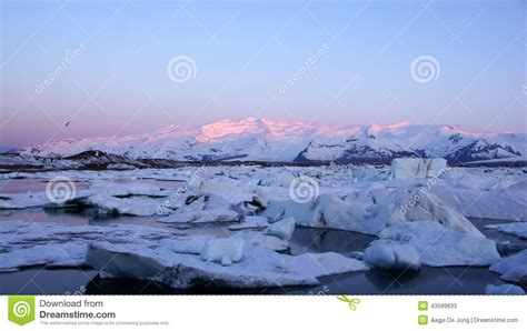 Sunrise At Jokulsarlon Glacier Lake Stock Image Image Of Reflections