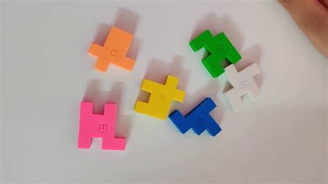 This is the solution to a fun wooden cube puzzle where each piece is connected using a string. How to solve Cube Puzzle Eraser? - YouTube