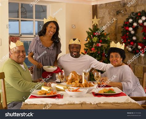On christmas morning, the child who found the pickle first would either receive an additional present or be the one to open his or her gifts first. Adult African American Family Having Christmas Dinner ...