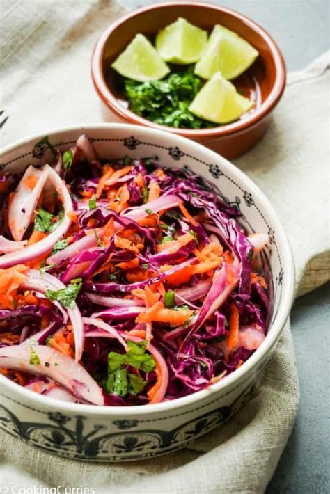 Slice the cabbage thin and julienne the carrots—then place everything into the largest mixing bowl you own. Easy and Simple Purple Cabbage Coleslaw for Tacos ...