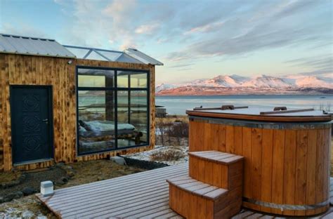 Glass Lodge On Icelandic Fjord Offers Stunning Views Of The Northern Lights