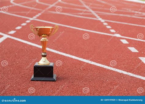 A Golden Trophy On Running Track Stock Image Image Of Line Champion