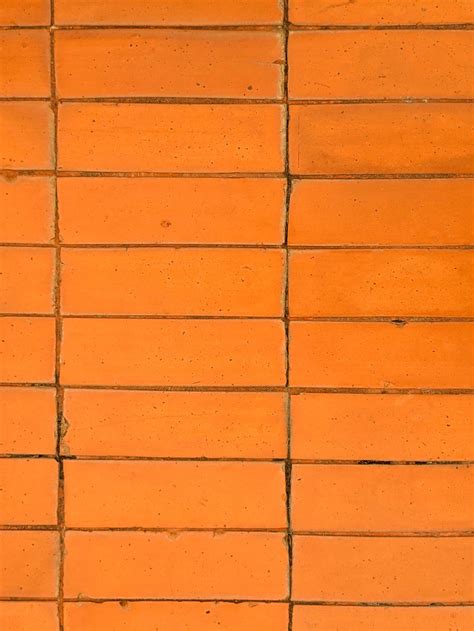 A Close Up Of Orange Brick Tile Textured Background 21680916 Stock