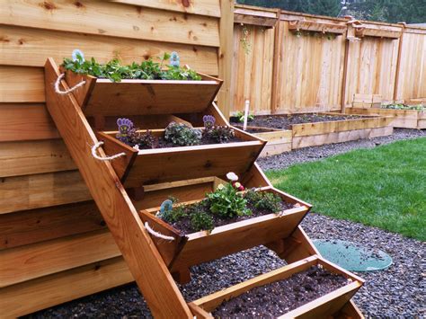 Plant stakes or tomato cages are needed when growing underneath your tomato planter containers, you should have a drainage tray to keep the water from video #1: Strawberry, Herb, Tomato, and Flower gardening window box ...