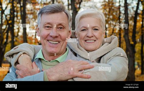Adult Old Woman Hug Beloved Husband By Shoulders Elderly Married Couple