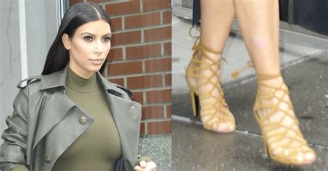 kim kardashian rocks lanvin trench coat and hermes heels