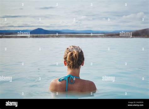 Woman Relaxing In Hot Tube Blue Lagoon In Iceland Happy Tourist In Spa