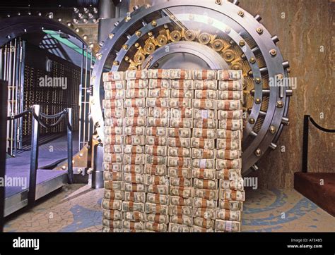 Money Stacked In Front Of A Bank Vault Stock Photo 1696948 Alamy