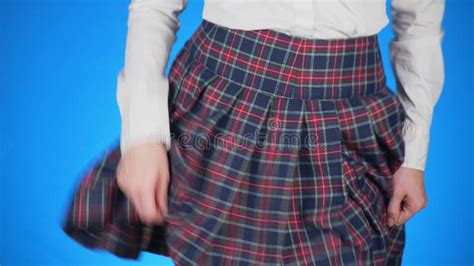 Midsection Of Teenage Girl Cheat Sheet Written On Hips Hidden Under A