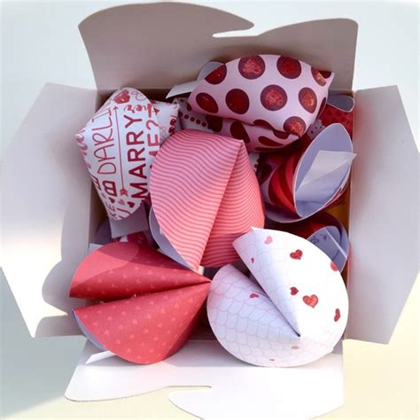 A fun chinese new year craft for kids, or even valentine's day, wedding favors, birthday secure the paper fortune cookie closed with an extra sticky glue dot positioned near the fold. Fun Paper Fortune Cookies for Valentine's Day | Martha Stewart
