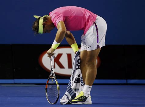 Nadal Of Spain Leans On His Racket During His Mens Singles Second