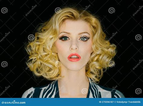 Portrait Of Beautiful Young Woman With Vintage Make Up And Hairstyle