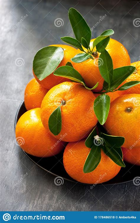 Ripe Juicy Tangerine Orange Mandarin With Leaves Stock Photo Image
