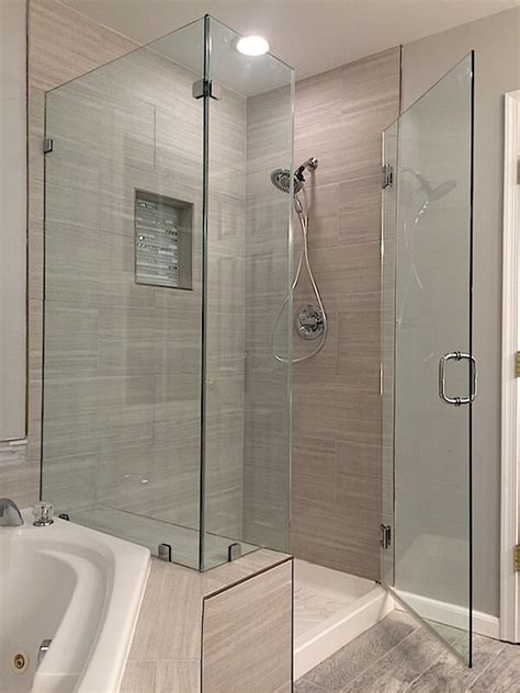 These doors have a piece of glass in the panel. Frameless Corner Shower Enclosures