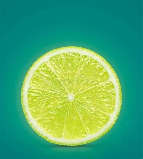 Perfect Yellow Lemon Slice On Green With Clipping Path Stock Photo