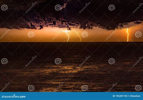 Storm Over The Ocean With Lightning Stock Photo Image Of Bright