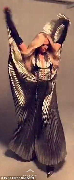 Play golden goddess for real money at Paris Hilton teases cleavage and long legs in photo shoot ...