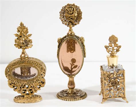 Collection Of French Antique Perfume Bottles In Gilded Brass And Cut