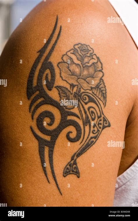 French Polynesia Traditional Polynesian Tattoo On Mans Arm Stock