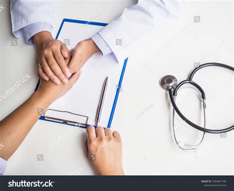 Doctor Holding Hands Encourage Explained Health Stock Photo 1584801748
