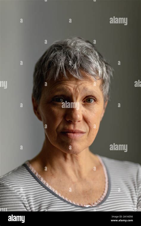 Portrait Of A Mature Woman Alone At Home Stock Photo Alamy