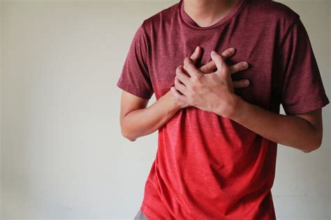 Premium Photo The Man Suffering From Chest Pain Heart Attack