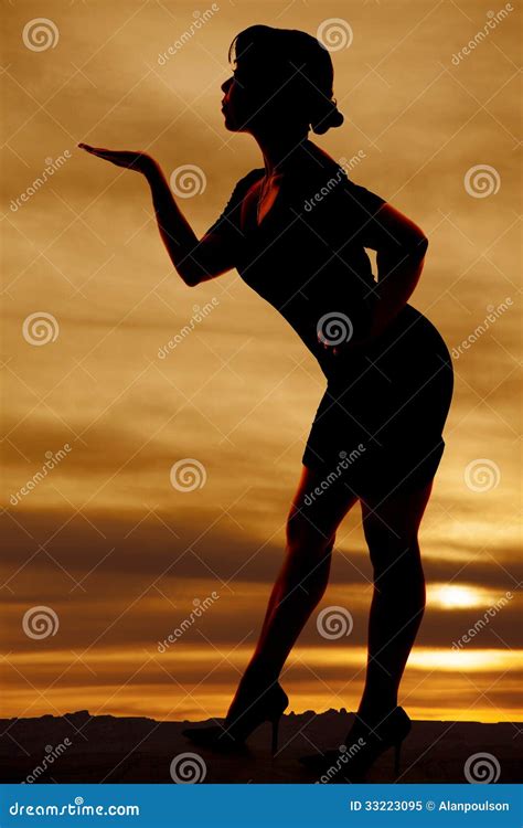 Silhouette Of A Woma Blowing A Kiss Stock Image Image Of Indoors
