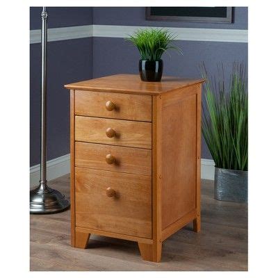 Mobile filing cabinets are usually small, and they have a lightweight design. 4 Drawers Studio File Cabinet Honey Brown - Winsome ...