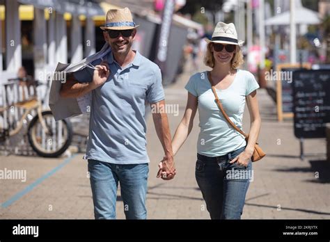 A Middle Aged Couple Walking Outdoors Stock Photo Alamy