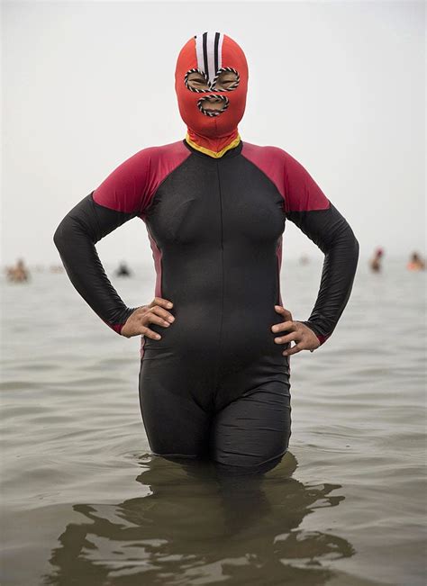 Women In China Wear These Crazy Face Masks To The Beach So They Dont