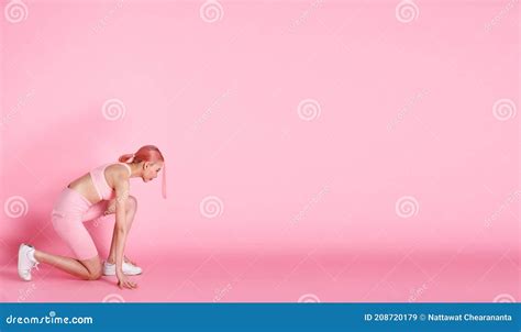 Concept Of Sweat Strong Success Women Over Pink Tone Background Stock
