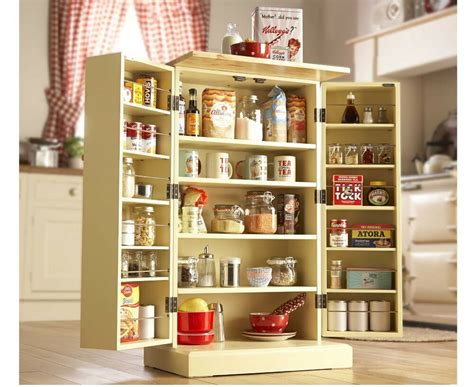 I seriously needed some kitchen cabinet organizers for my messy kitchen storage cabinets. Freestanding Larder Wooden Cupboard Buttermilk Kitchen ...