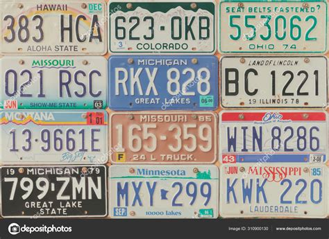 Vintage Car License Plates On A Wall Stock Editorial Photo