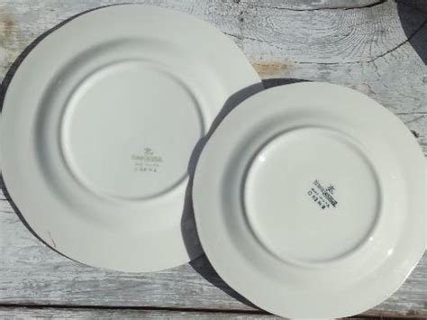Maybe you would like to learn more about one of these? vintage Homer Laughlin china plates, pink magnolia branch ...