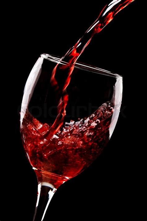 Red Wine Pouring Into Glass Stock Image Colourbox