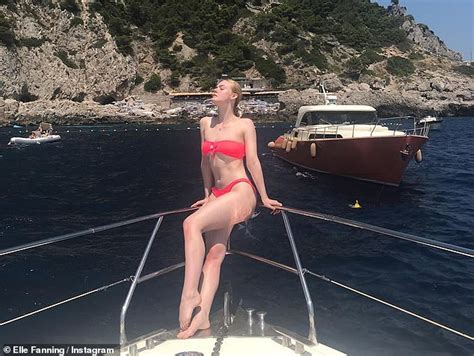 Elle Fanning Stuns In Hot Pink Bikini In Italy Daily Mail Online