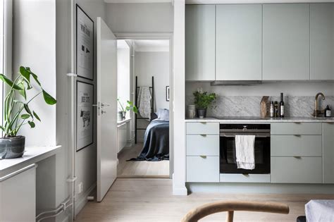 Room decor in mint green is in! Mint green kitchen in a cozy living space - COCO LAPINE ...