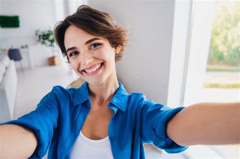 Photo Of Cheerful Nice Person Toothy Smile Make Selfie Record Video Pastime Bright Modern House