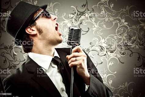 Man Singing With Microphone Stock Photo Download Image Now Istock