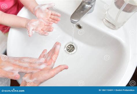 Children Wash Their Hands With Soap In The Sink Children And Personal