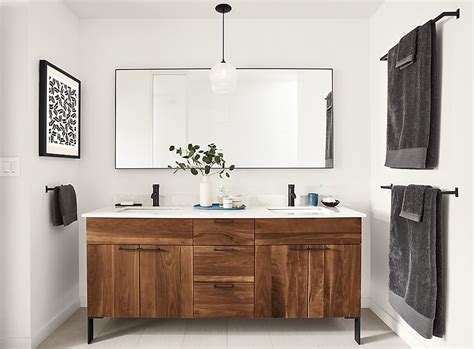 Including the vanity and assorted top, these sets offer the perfect balance between style and functionality. Kenwood Walnut Vanity in Bathroom - Room & Board